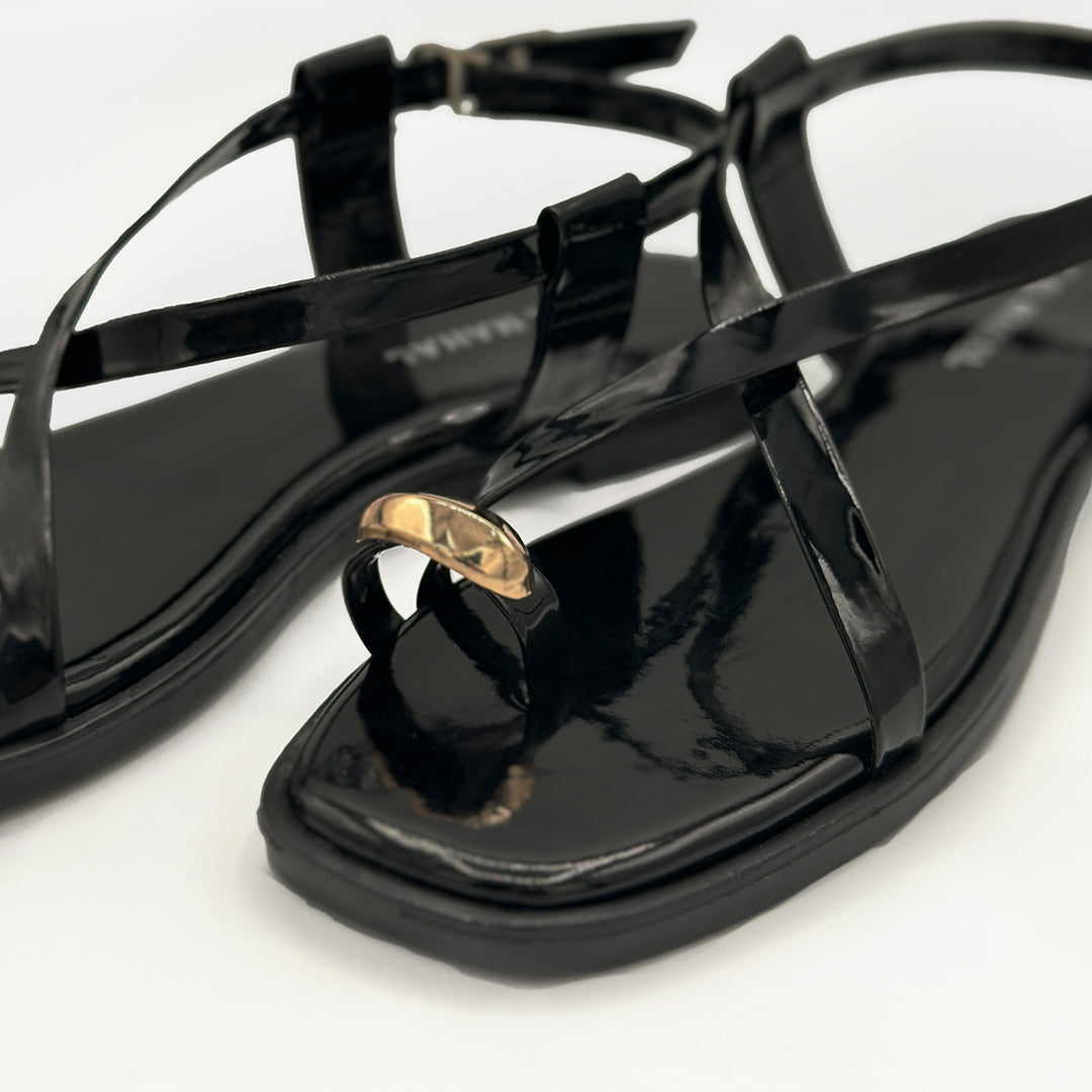 Black Charm patent cross strap flat sandals gold detail close-up women Pakistan – Laal Mahal