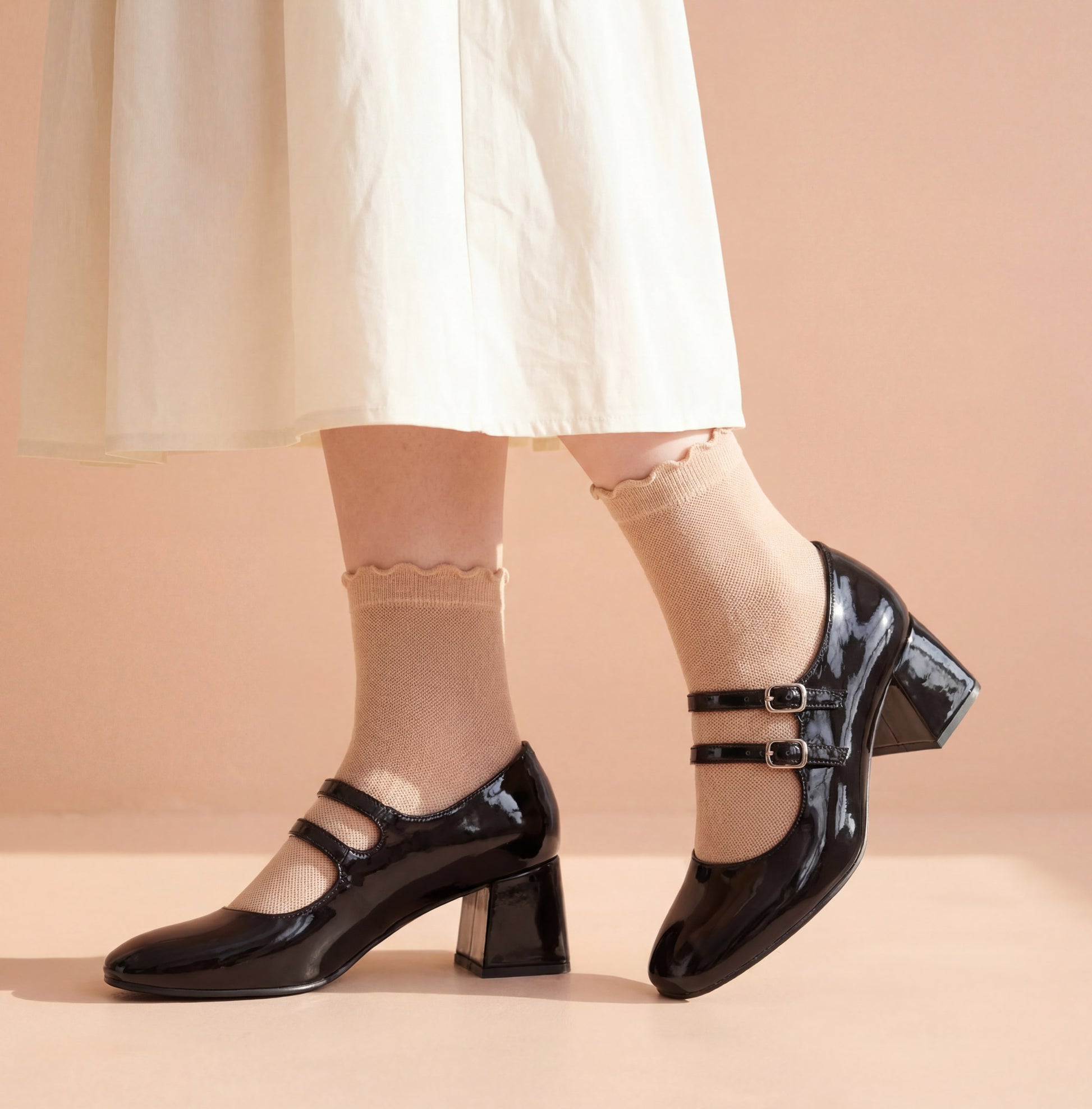 Black mary jane block heels worn on feet close up Pakistan — Laal Mahal