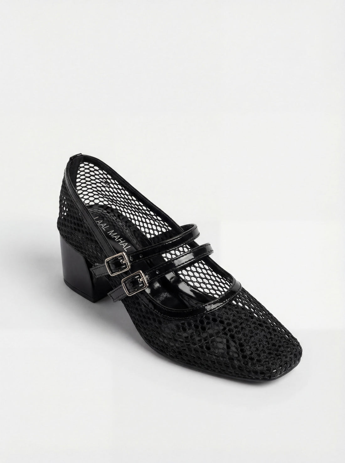 Black mesh block heels worn with black skirt lifestyle Pakistan — Laal Mahal