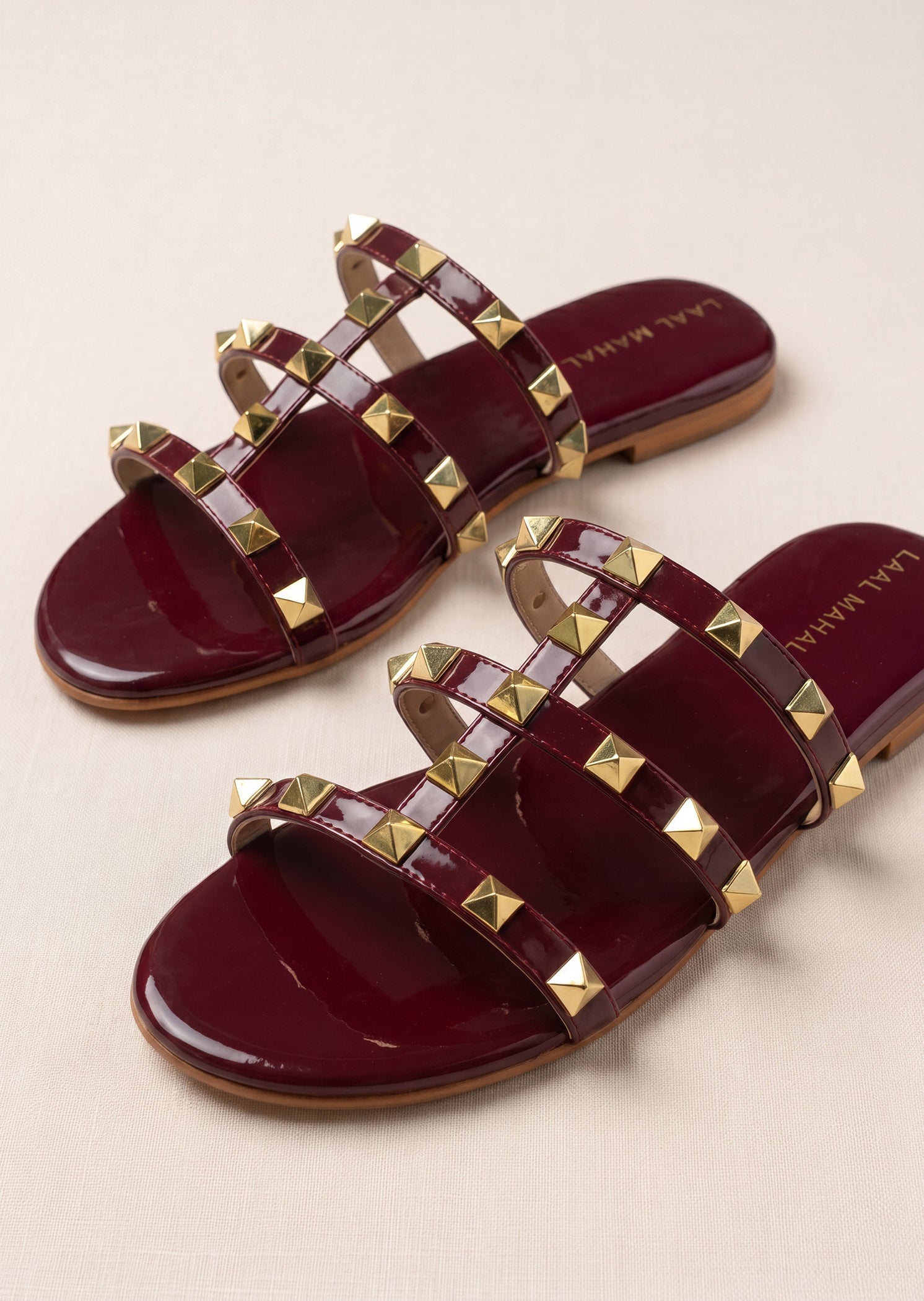 Burgundy rockstud flat slides side profile Pakistan — Laal Mahal