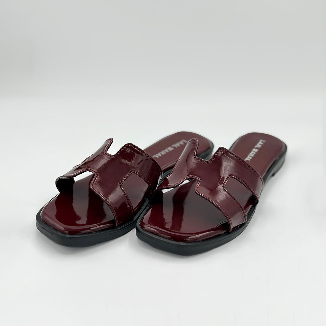 Cherry Chic burgundy patent leather flat slides pair front view studio white background Pakistan — Laal Mahal