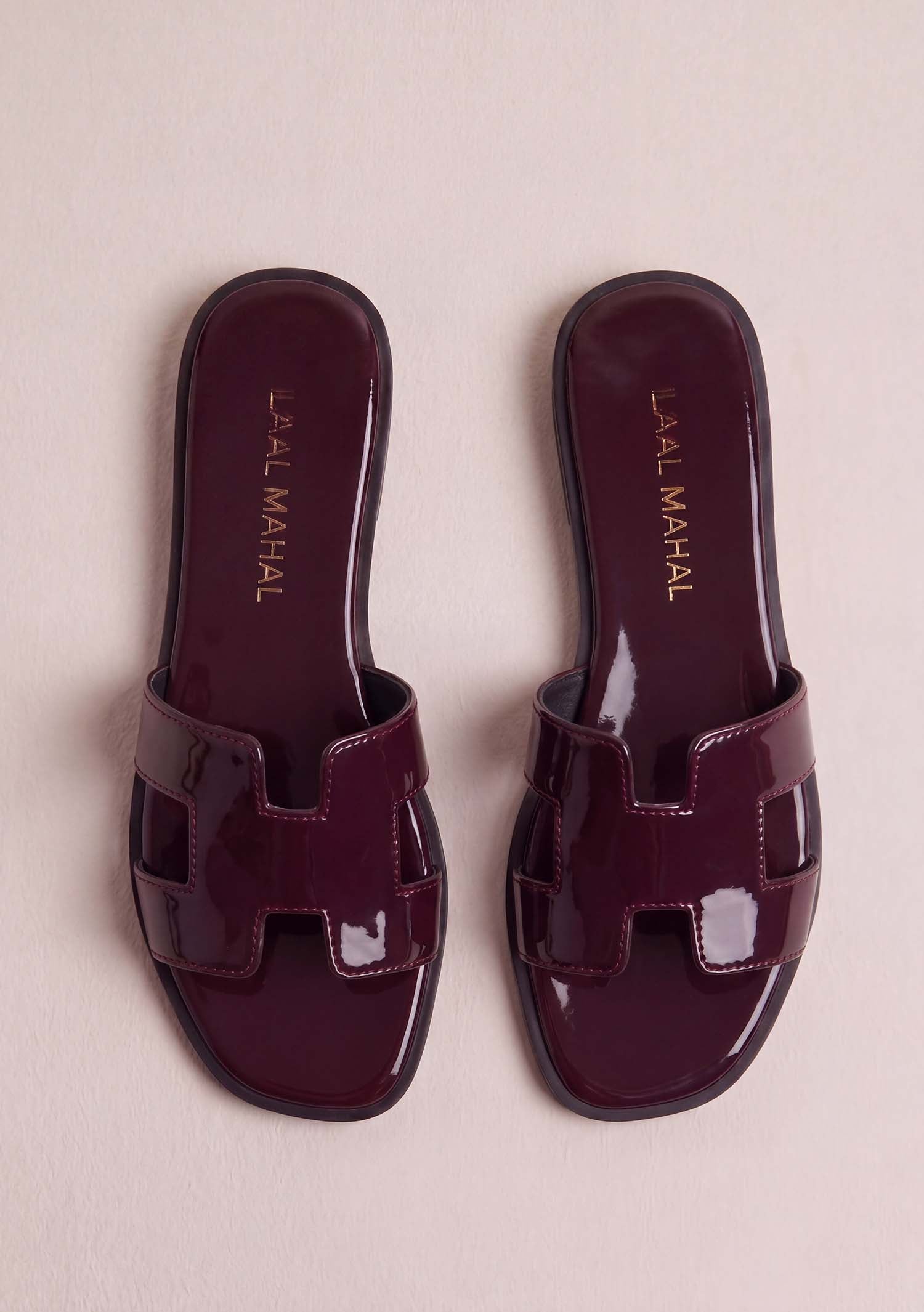 Cherry Chic burgundy patent leather flat slides pair overhead top view Pakistan — Laal Mahal