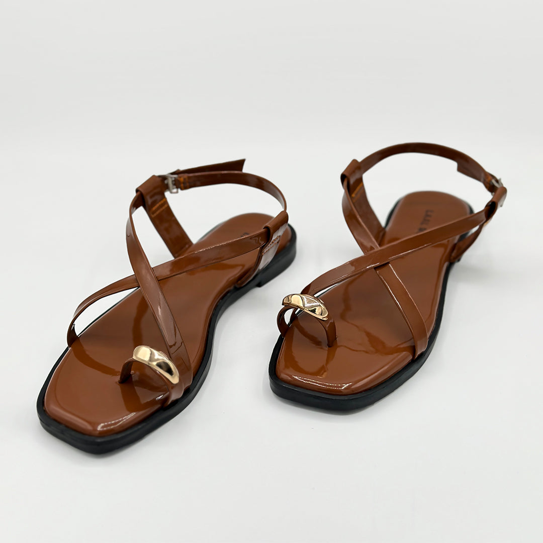 Cocoa Vibe brown patent cross strap flat sandals top view women Pakistan – Laal Mahal