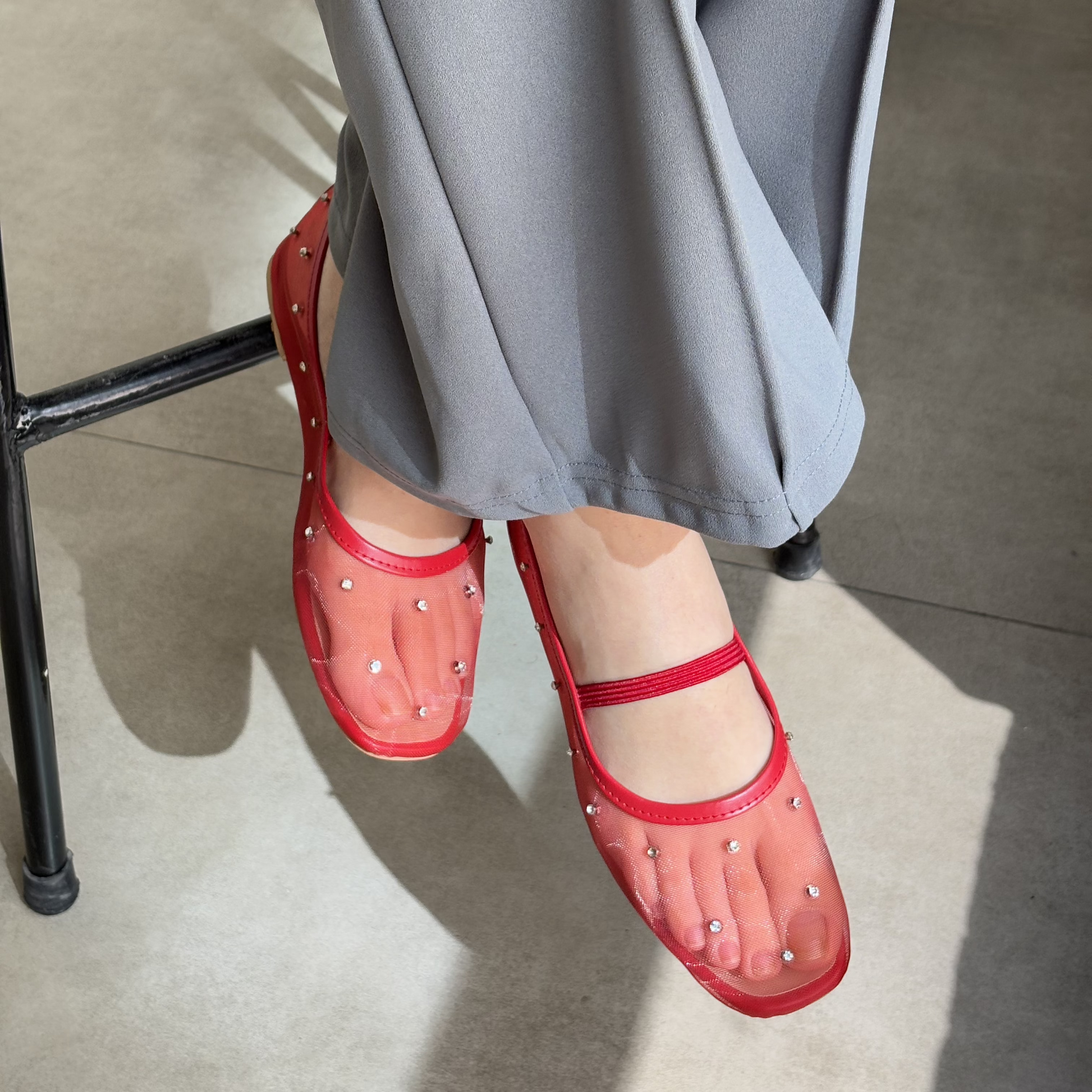 Crystal Gaze red rhinestone ballet flat shoes worn with grey trousers Pakistan — Laal Mahal