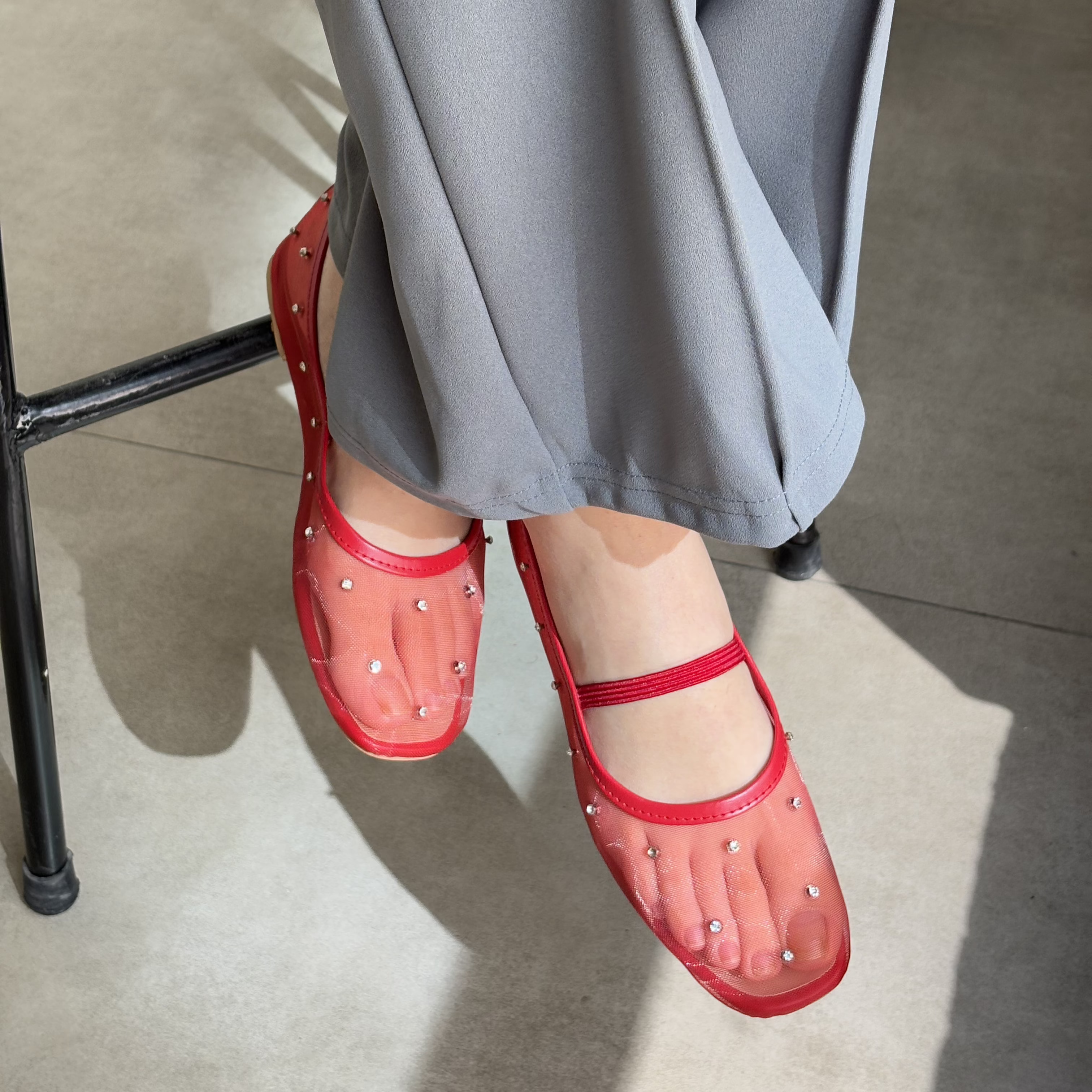 Crystal Gaze red rhinestone ballet flat shoes worn with grey trousers Pakistan — Laal Mahal