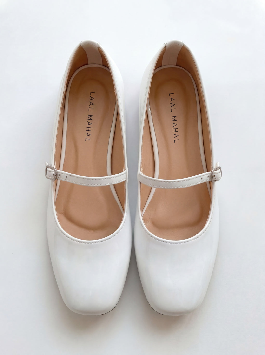 Dove Walk white patent leather mary jane flat shoes worn with black skirt Pakistan — Laal Mahal