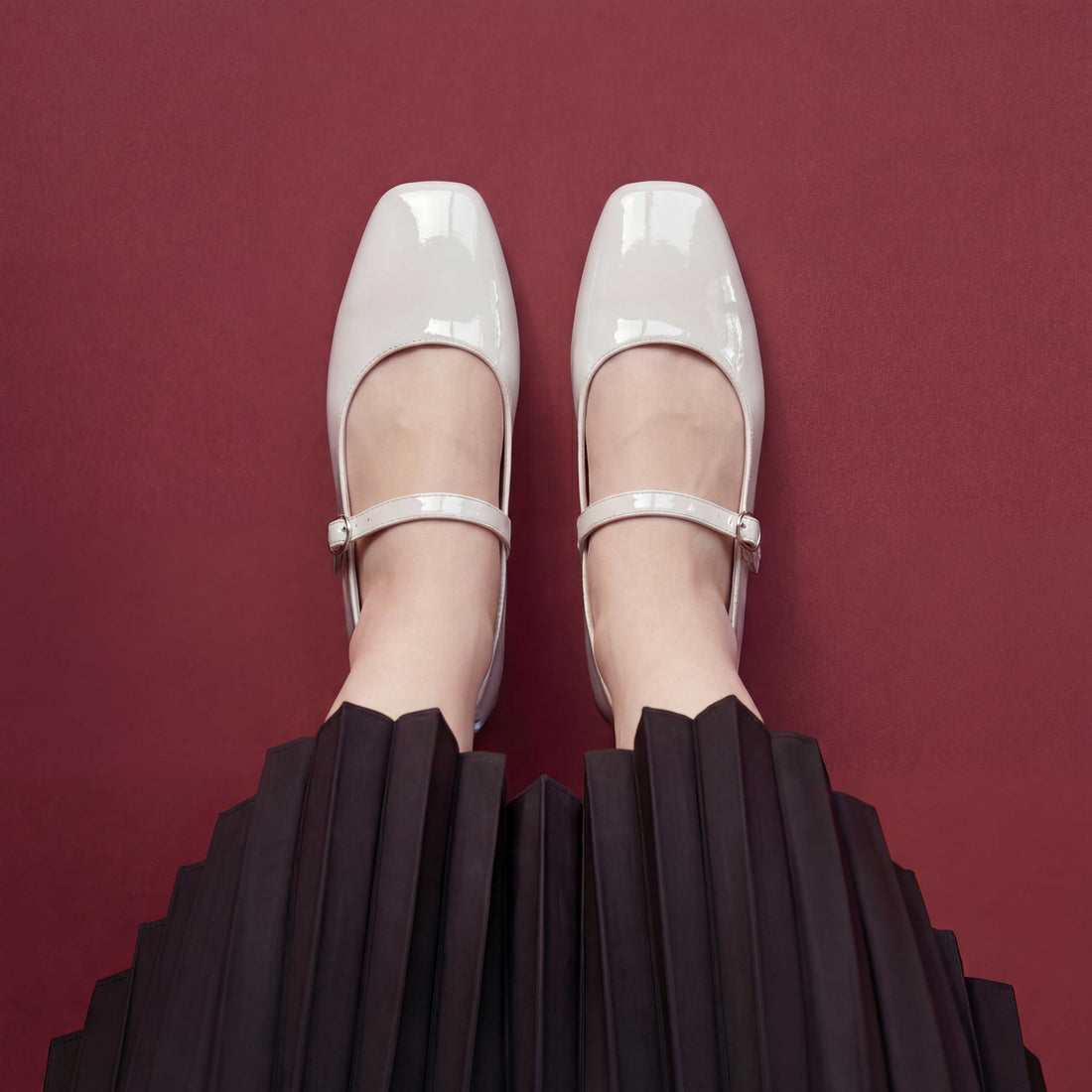 Dove Walk white patent leather mary jane flat shoes worn with black skirt Pakistan — Laal Mahal