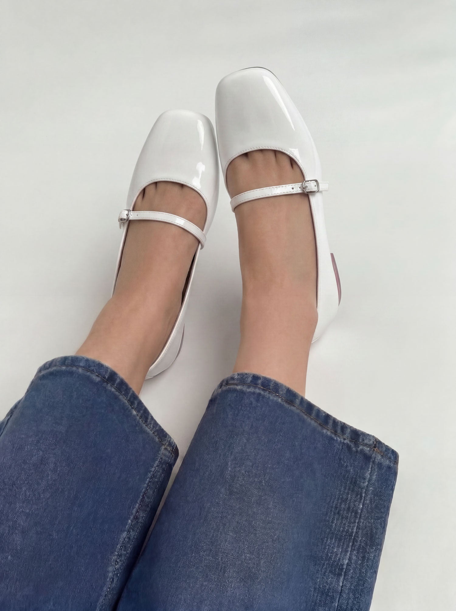 Dove Walk white patent leather mary jane flat shoes worn with jeans Pakistan — Laal Mahal