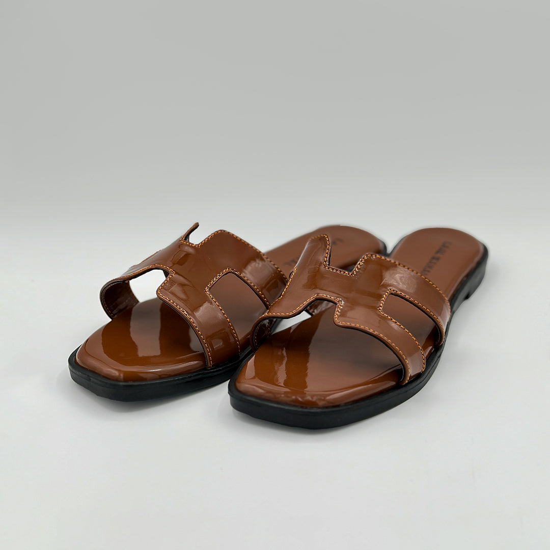 Hazel Hue brown patent H-strap slide flats detail shot women Pakistan – Laal Mahal