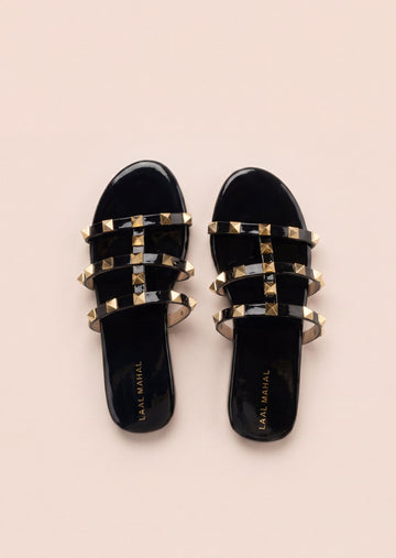 Laal Mahal Rockstud Flat Slide Sandals black top view showing branded insole and gold pyramid stud triple straps