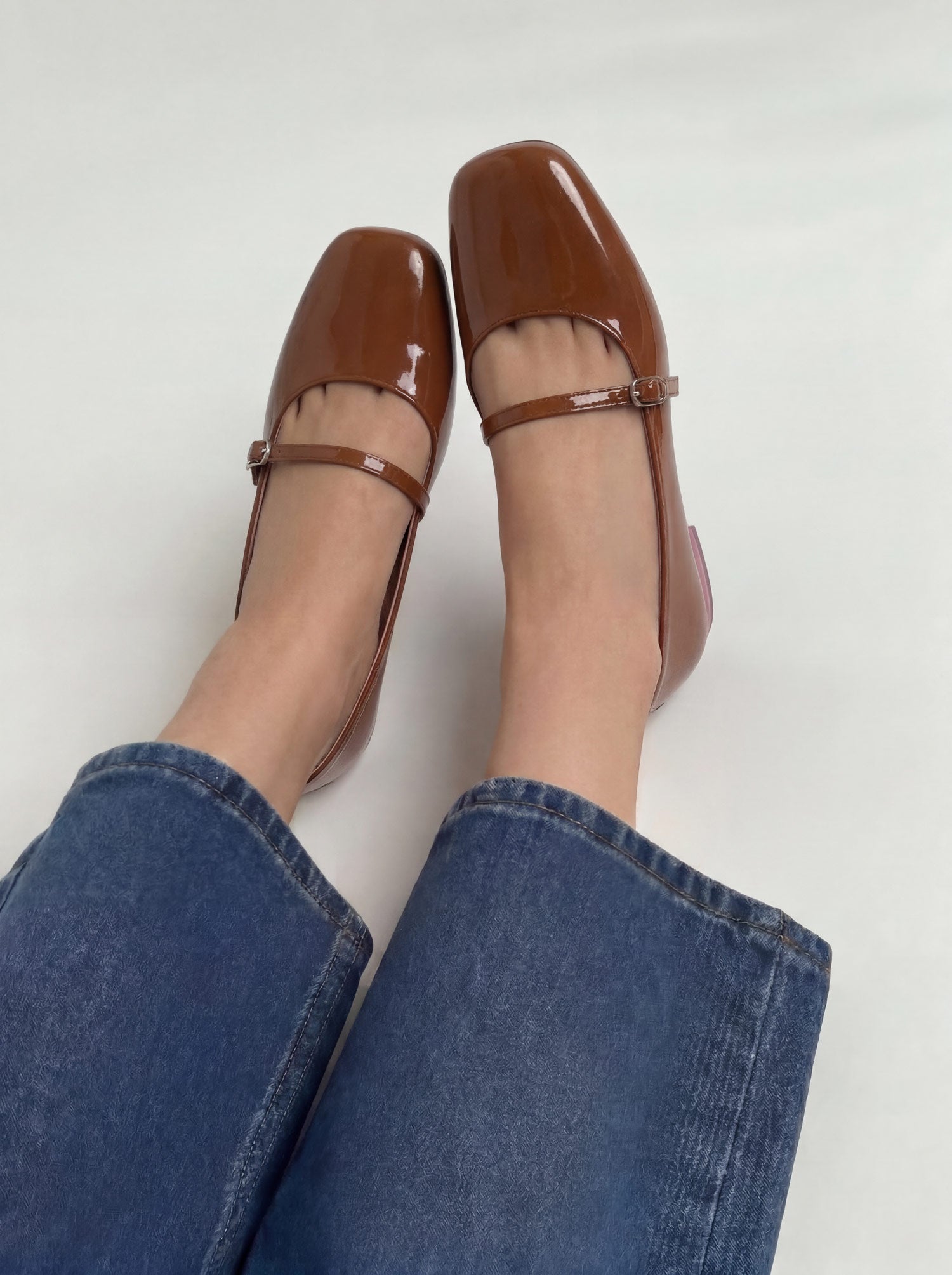 Mocha brown patent leather mary jane flat shoes worn with jeans Pakistan — Laal Mahal