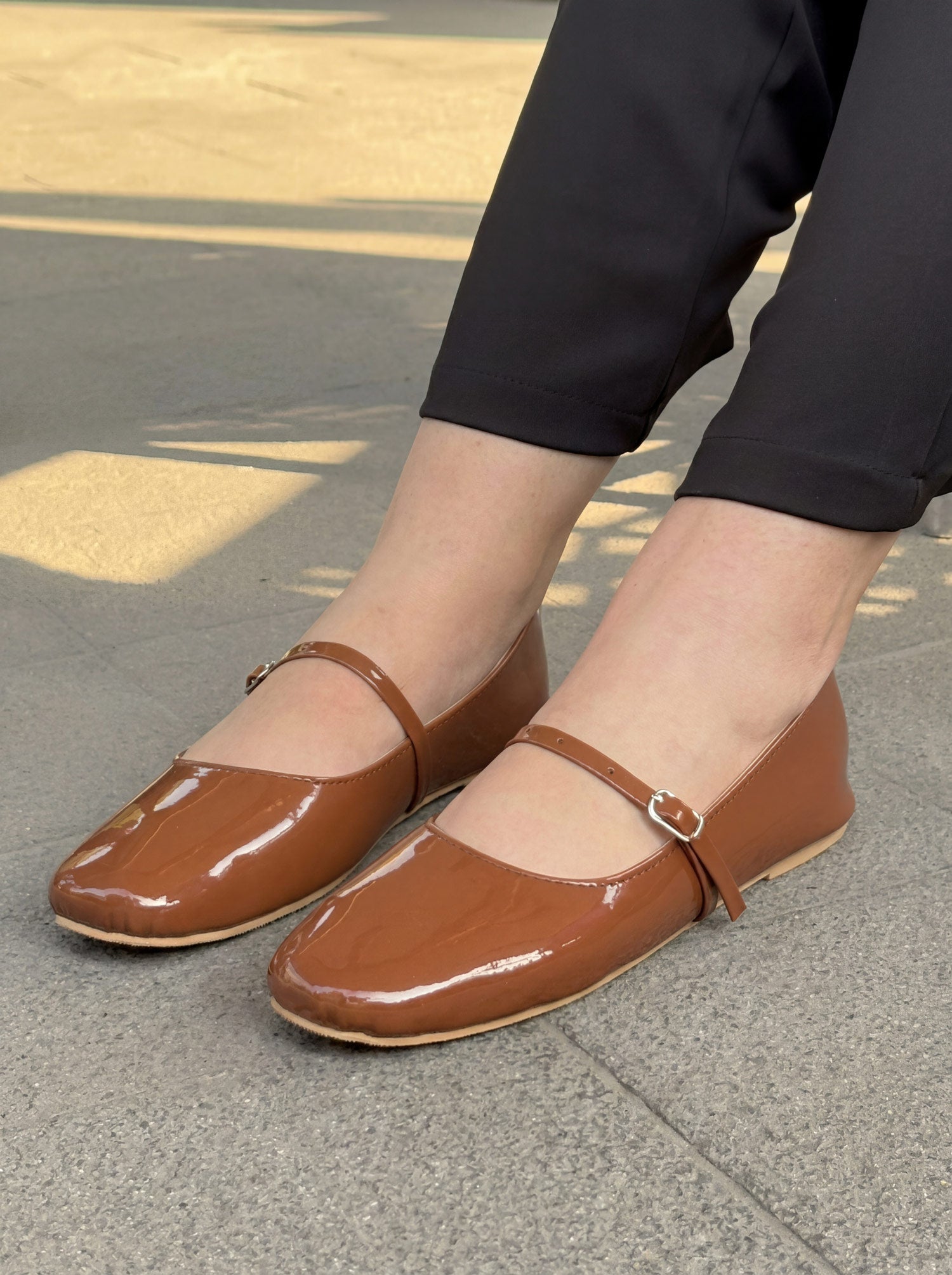 Mocha brown patent leather mary jane flat shoes worn with black trousers Pakistan — Laal Mahal