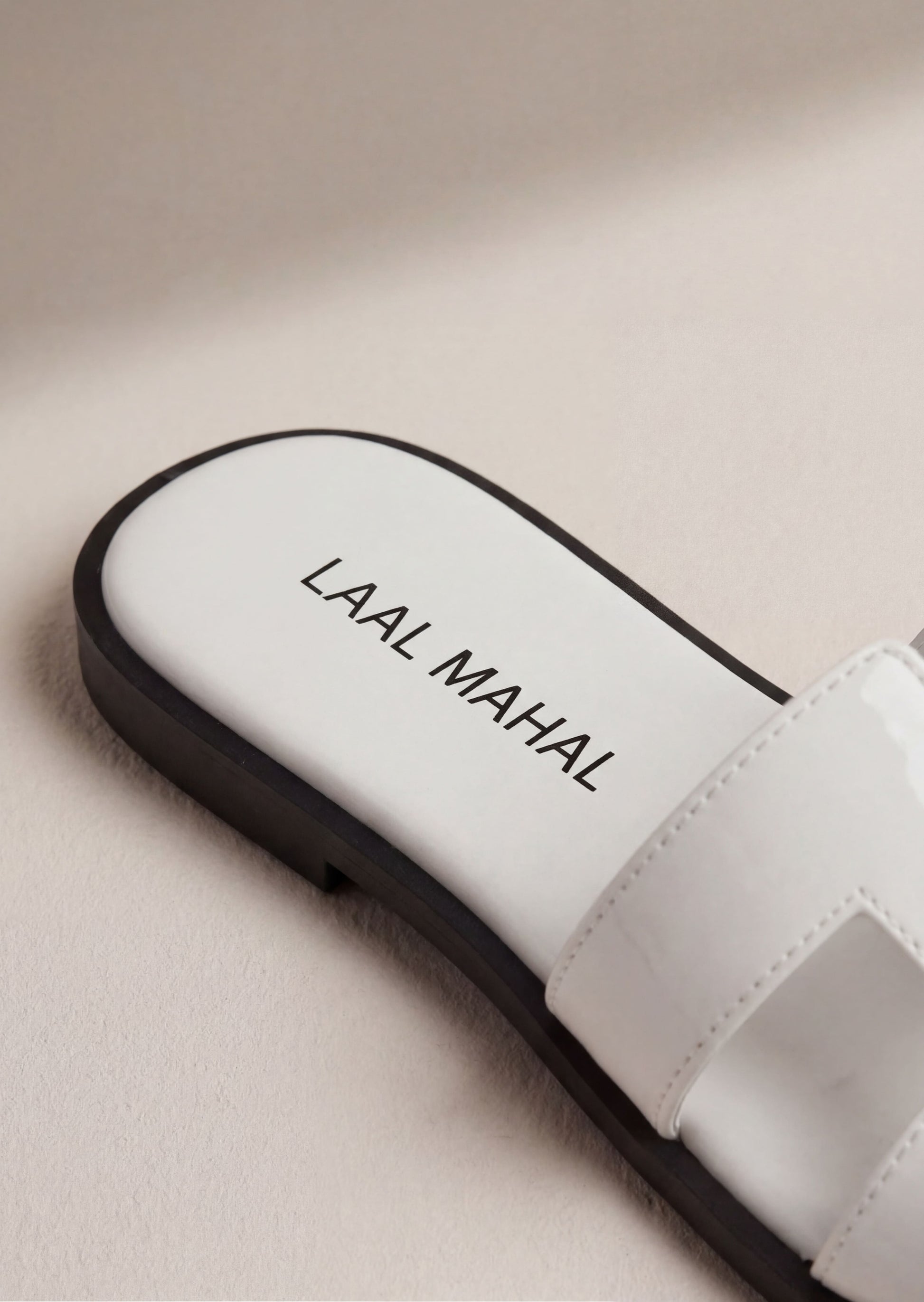 Pearla white H-strap slide flats sole detail Laal Mahal Pakistan