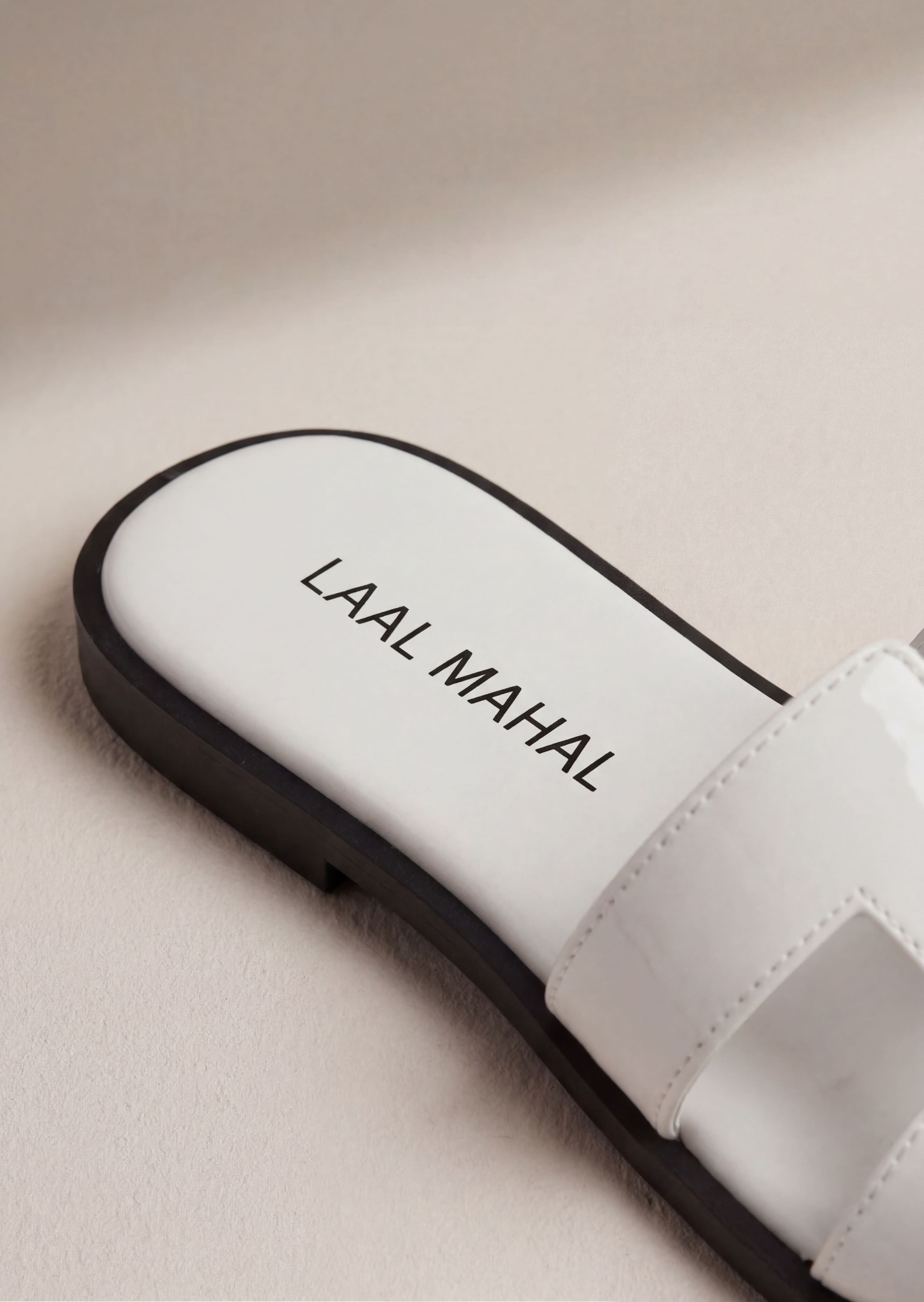 Pearla white H-strap slide flats sole detail Laal Mahal Pakistan